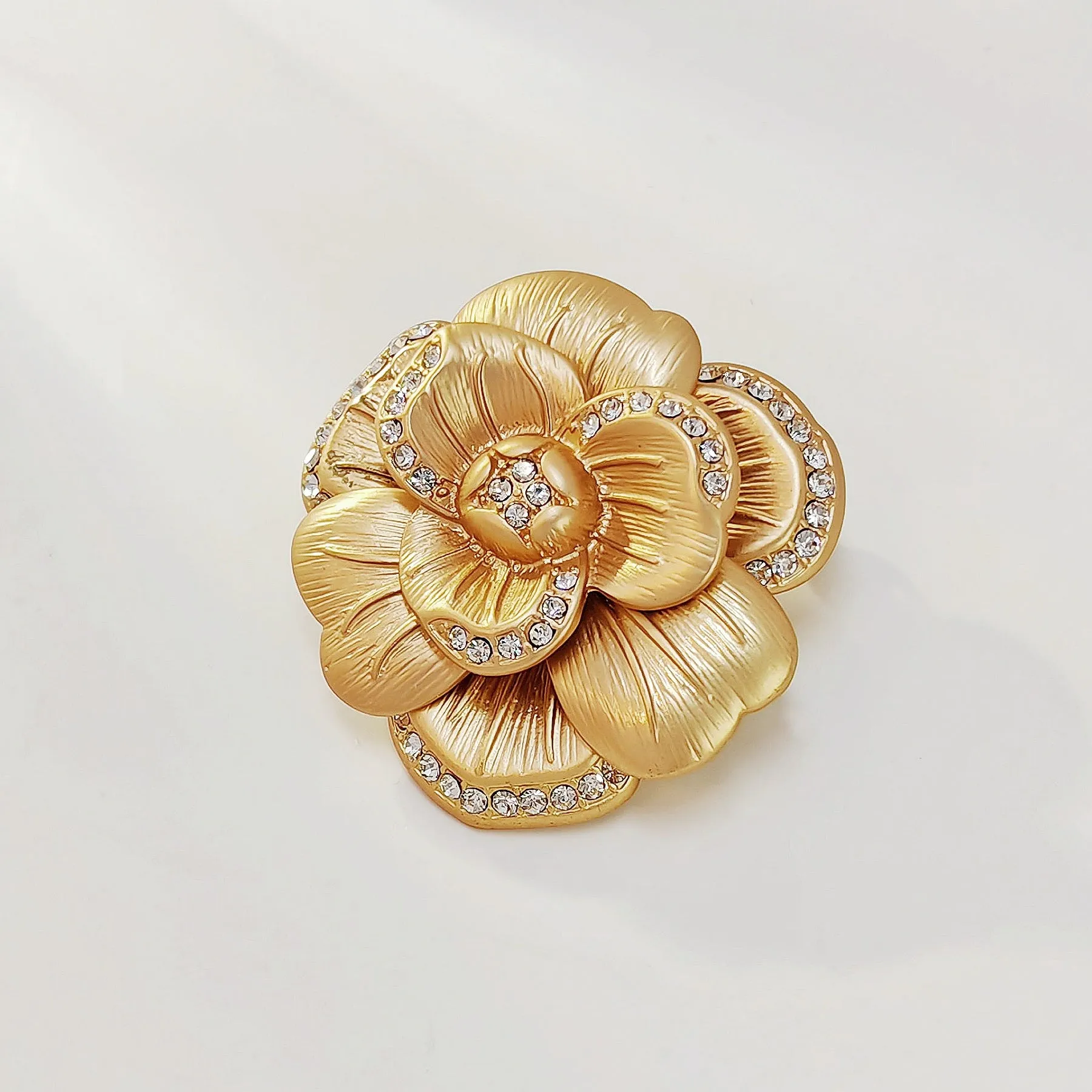 Elegancy Gold Metallic Bloom Camellia Flower Brooch Pin with Crystal Accent