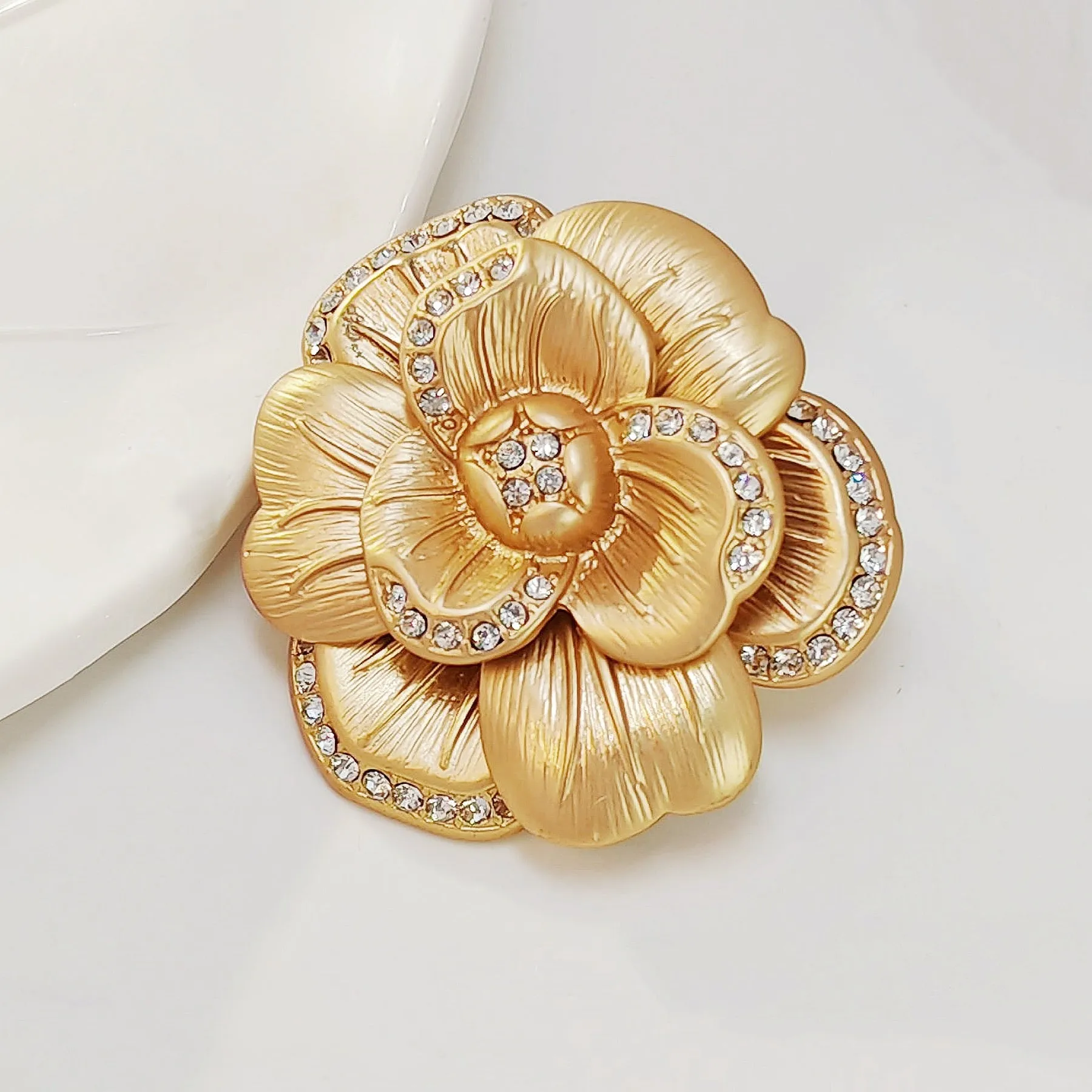 Elegancy Gold Metallic Bloom Camellia Flower Brooch Pin with Crystal Accent