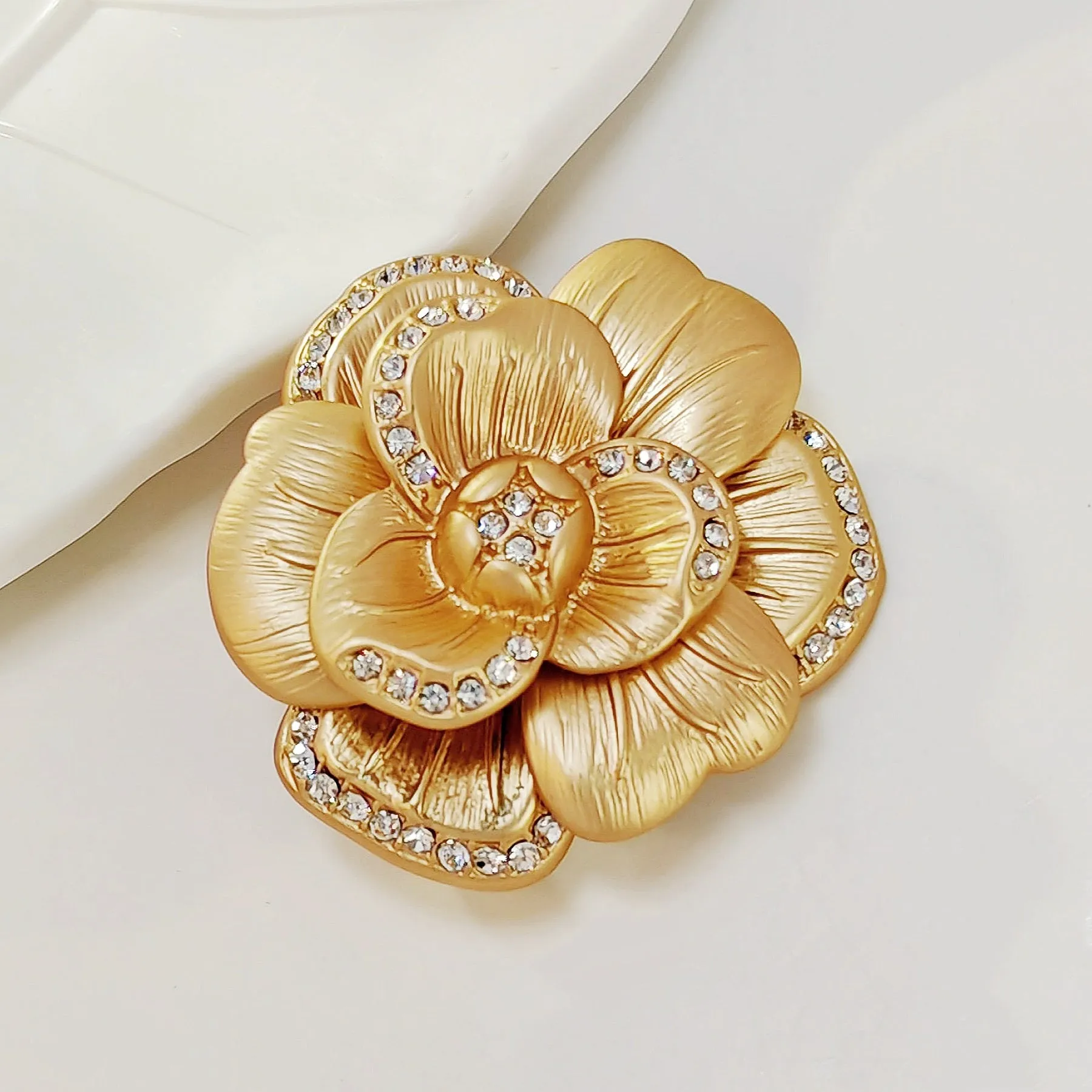 Elegancy Gold Metallic Bloom Camellia Flower Brooch Pin with Crystal Accent