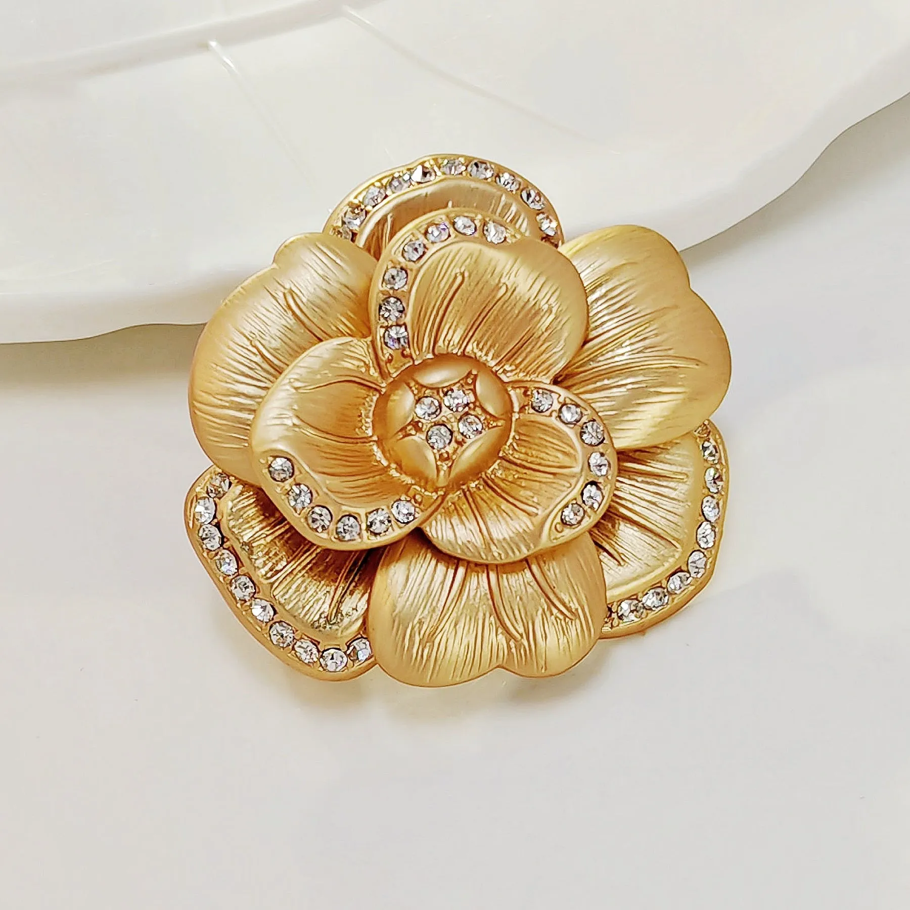 Elegancy Gold Metallic Bloom Camellia Flower Brooch Pin with Crystal Accent