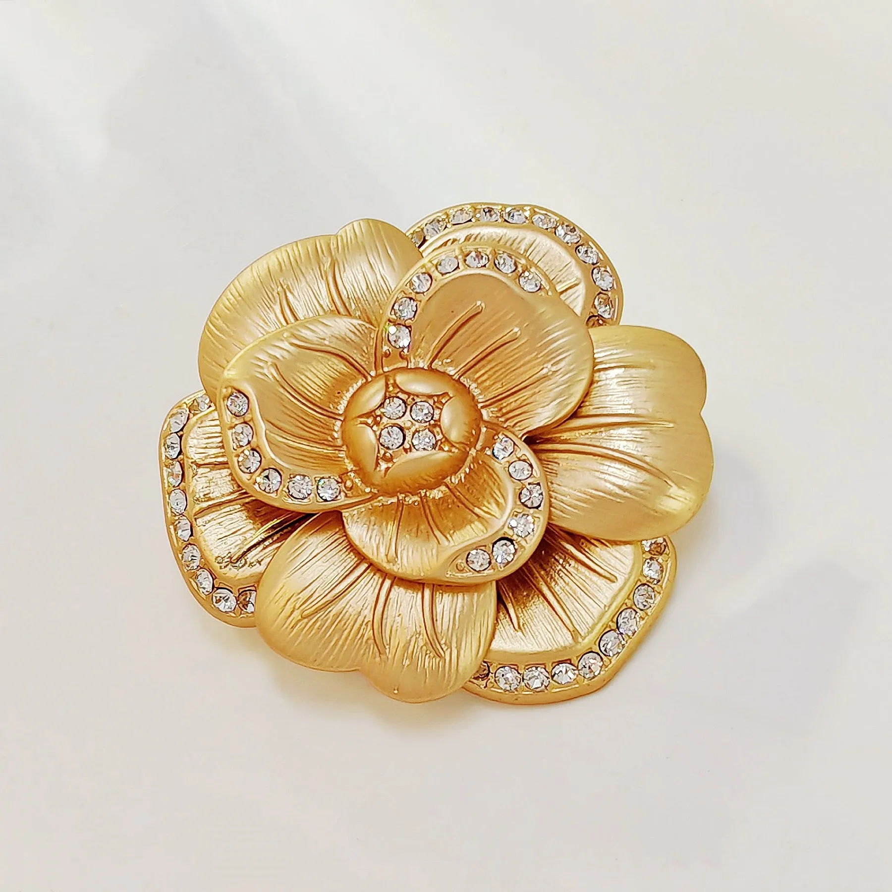 Elegancy Gold Metallic Bloom Camellia Flower Brooch Pin with Crystal Accent