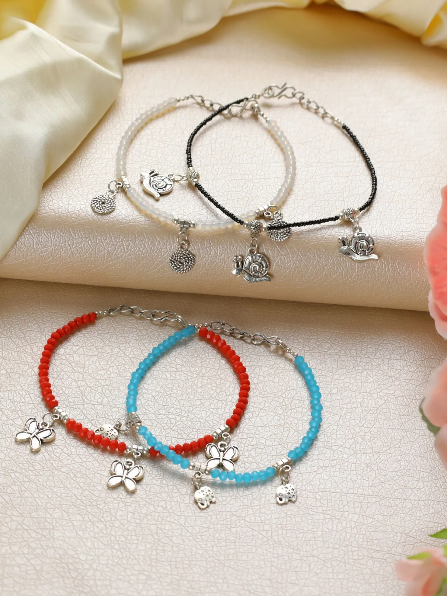 Set Of 4 Silver Elephant Flower Butterfly, Circle & Cocoon Charms Beaded Handcrafted Anklets