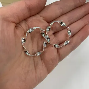 Twist hoops